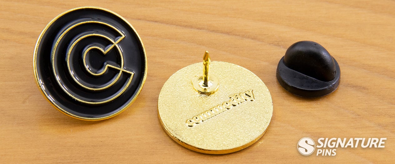 commodity soft enamel pin with backstamp from signature pins